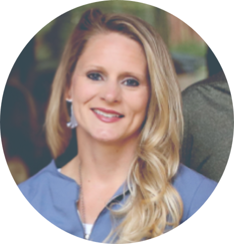 Alyssa Sullivan, Human Resources Director at American Solutions for Business, is smiling with her long blonde hair in a side part. She wears a light blue top and silver earrings, with the background softly blurred.