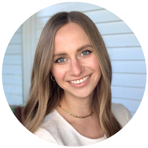 A young woman with long, light brown hair smiles at the camera. Becky Thesing, from American Solutions for Business, wears a white top and gold chain necklace, standing in front of a white, horizontal paneled background. She specializes in Vendor Relations.
