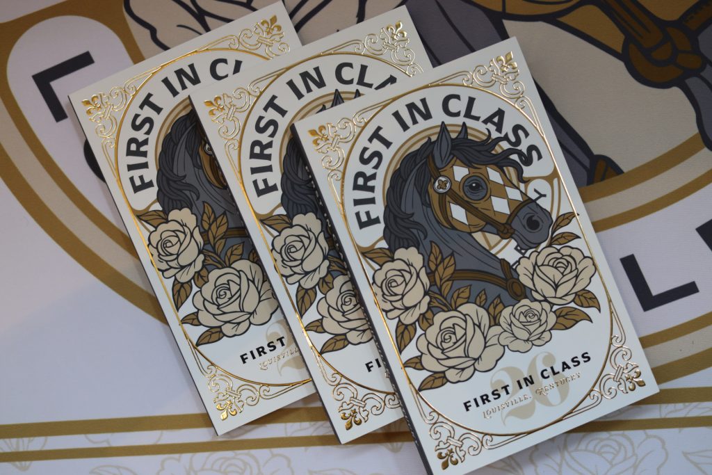 Three "First in Class" cards featuring an illustrated black horse surrounded by gold and white roses, ornate gold detailing, and bold lettering—perfect for commemorating the National Sales Conference in Louisville, Kentucky.